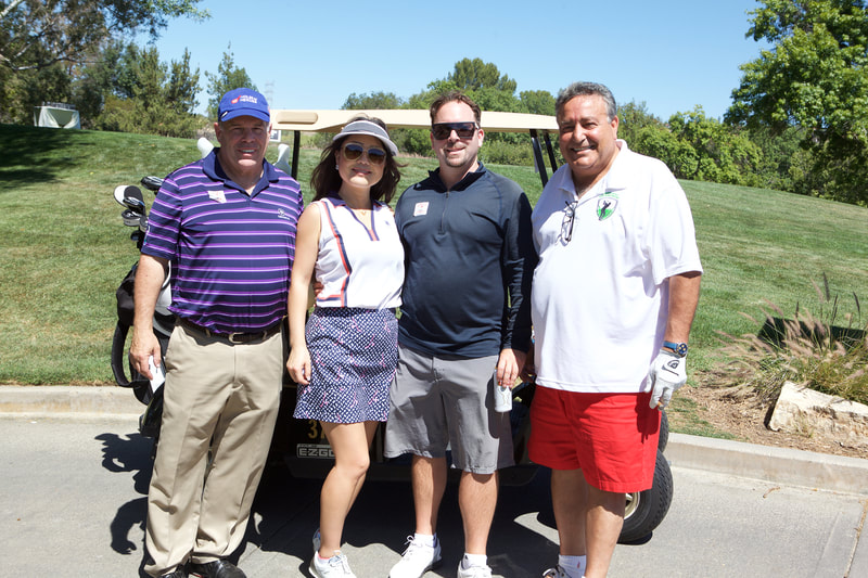 Golfers on the course by golf tournament photos and Donna Coleman Photography in Tarzana for the Play for Parkinson's